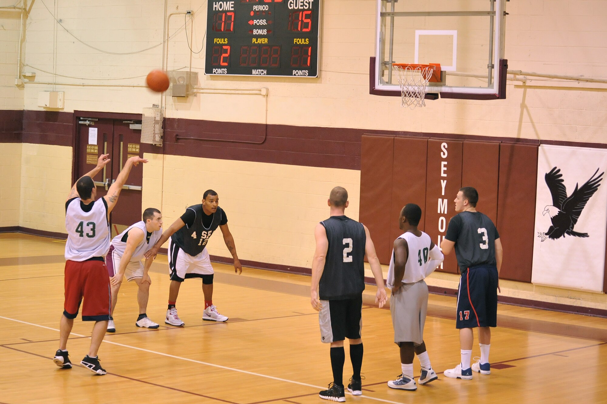 SEYMOUR JOHNSON AIR FORCE BASE, N.C. – Airman 1st Class Nickolas Simmons shoots a free throw during an intramural basketball game here, Feb. 16, 2011. A free throw shot, is taken behind the foul line, is given to penalize the other team for committing a foul. Airman Simmons hails from Kaiserslautern, Germany. (U.S. Air Force photo/Senior Airman Whitney Lambert) (RELEASED)