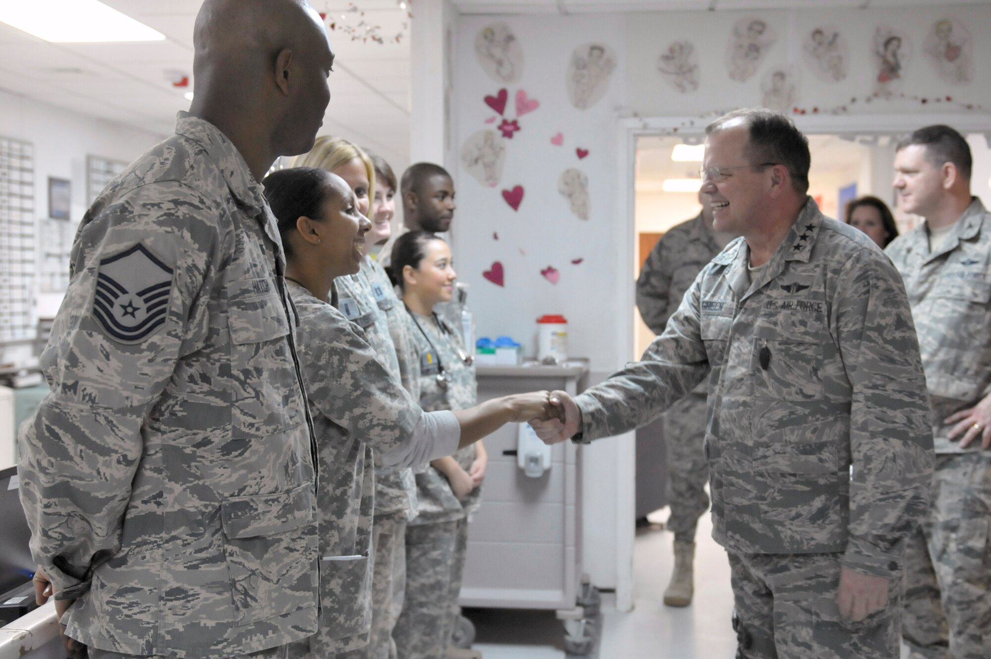 Air Force Surgeon General Lt. Gen. (Dr.) Charles B. Green meets members of the 455th Expeditionary Medical Group Feb. 13, 2011, at the Craig Joint Theater Hospital at Bagram Airfield, Afghanistan. (U.S. Air Force photo/Tech. Sgt. Michael Voss)