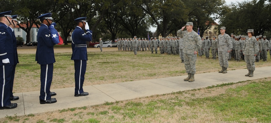 The Barksdale Honor Guard report to Col. Scott Hoover, 2nd Mission Support Group commander and state the flag is secure during the 2 MSG retreat ceremony at the 2nd Bomb Wing Headquarters building at Barksdale Air Force Base, La., Feb. 16. (U.S. Air Force photo/Senior Airman Alexandra M. Boutte) (RELEASED) 

