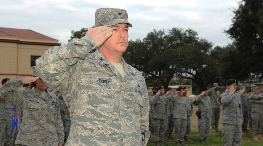 Colonel Scott Hoover, 2nd Mission Support Group commander, renders a salute during retreat ceremony at the 2nd Bomb Wing Headquarters on Barksdale Air Force Base, La., Feb. 16. (U.S. Air Force photo/Senior Airman Alexandra M. Boutte) (RELEASED) 

