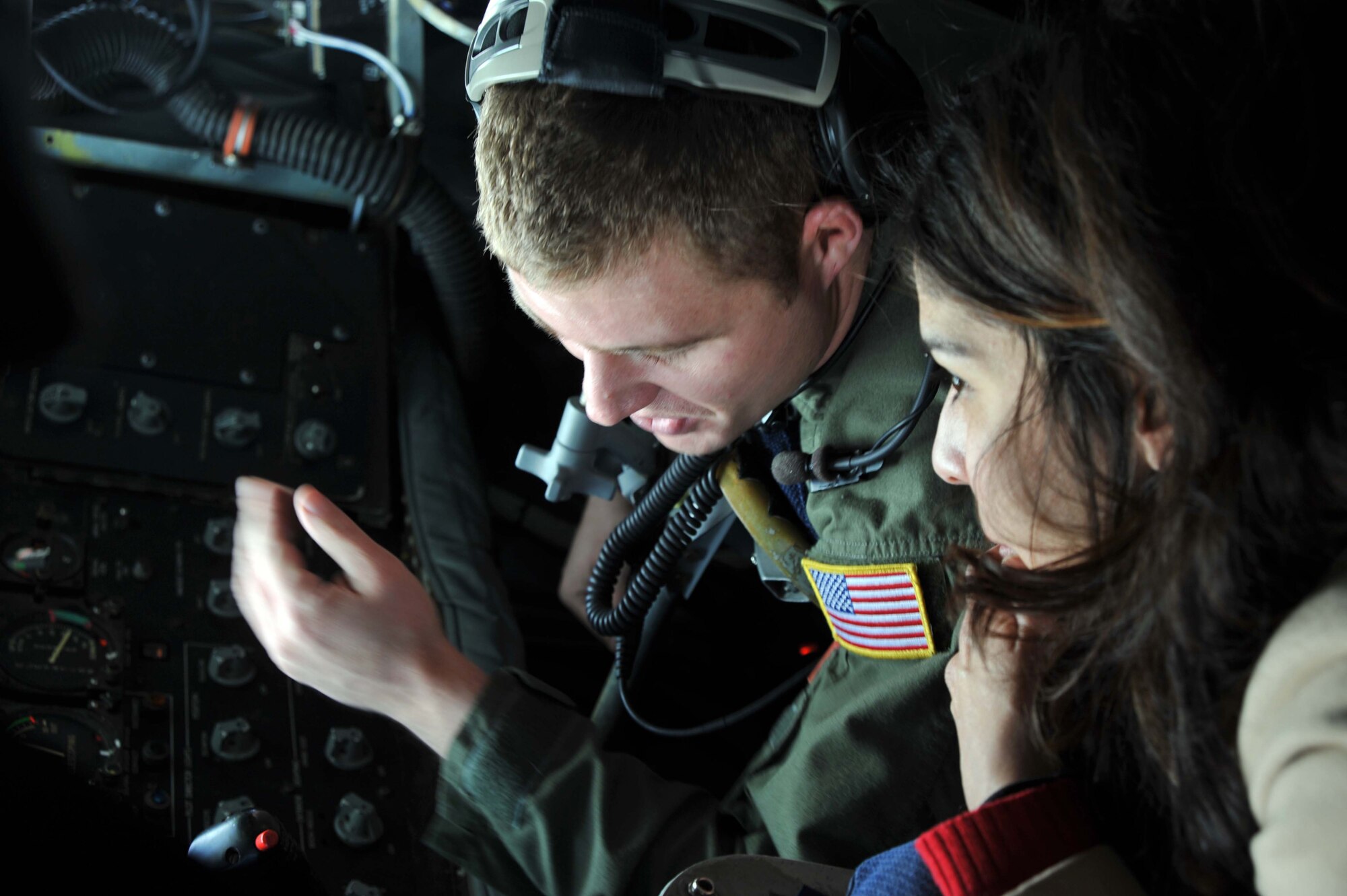 Staff Sgt. Patrick Martin, 344th Air Refueling Squadron boom operation, summarizes the air refueling process to Dana Nanninga, Kansas Agricultural and Rural Leadership member, Feb. 10, 2011.  Members of KARL toured McConnell to learn about the base’s refueling mission, as well as its history and Bird Aircraft Strike Hazard program.  (U.S. Air Force photo/Senior Airman Abigail Klein)
