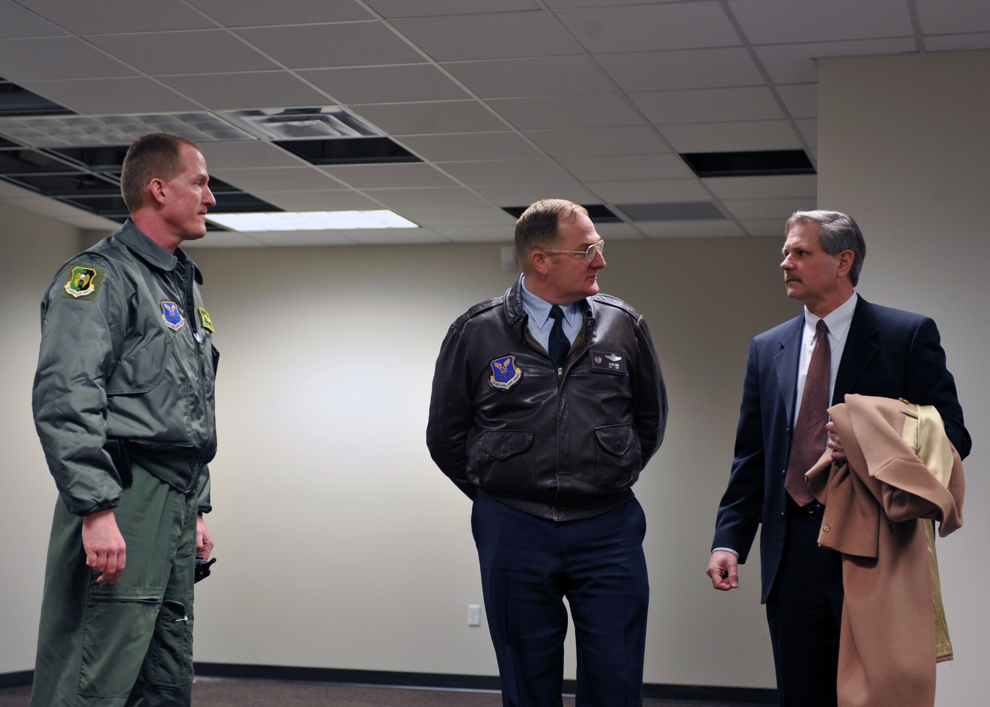 MINOT AIR FORCE BASE, N.D. -- Sen. John Hoeven, R-N.D., visits one of the many renovation projects on the base with Col. Doug Cox (pictured center), 5th Bomb Wing commander, and Col. Troy VanBemmelen, 5th Operations Group commander, here Feb. 11.  This was his first visit since being elected to the Senate to discuss topics concerning Team Minot, including military construction and the Strategic Arms Reduction Treaty. (U.S. Air Force photo/Staff Sgt. Keith Ballard)