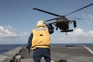 CARIBBEAN SEA (Feb. 12, 2011) Army aviators assigned to the Joint Task Force-Bravo 1-228 Aviation Battalion, Soto Cano Air Base, Honduras, conduct landing qualifications aboard the amphibious dock landing ship USS Gunston Hall (LSD 44). Joint Task Force-Bravo’s mission is to conduct and support joint, combined, and interagency operations, and to support contingency operations throughout region in order to enhance theater-wide security, stability, prosperity and reinforce cooperation. (U.S. Army photo by Sgt. Kevin L. Pruitt)  

