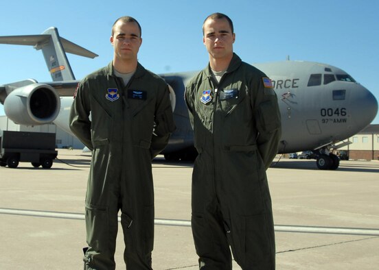 ALTUS AIR FORCE BASE, Okla. – Airmen 1st Class Michael and Stephen Greer are identical twins and currently training to be C-17 Globemaster III loadmasters students in the 97th Training Squadron. The identical twins postponed their enrollment to the University of Mississippi to compete in pole vaulting in order to join the 172nd Airlift Wing at Jackson Air National Guard Base, Miss. The brothers will resume their education in August. (U.S. Air Force photo by Staff Sgt. Clinton Atkins 97th Air Mobility Wing)