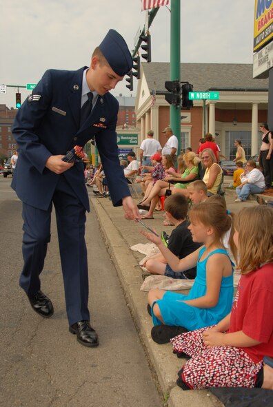 Senior Airman Joshua Curtis, 178th Fighter Wing participates in the Springfield Ohio Memorial Day parade, May 31, 2010.