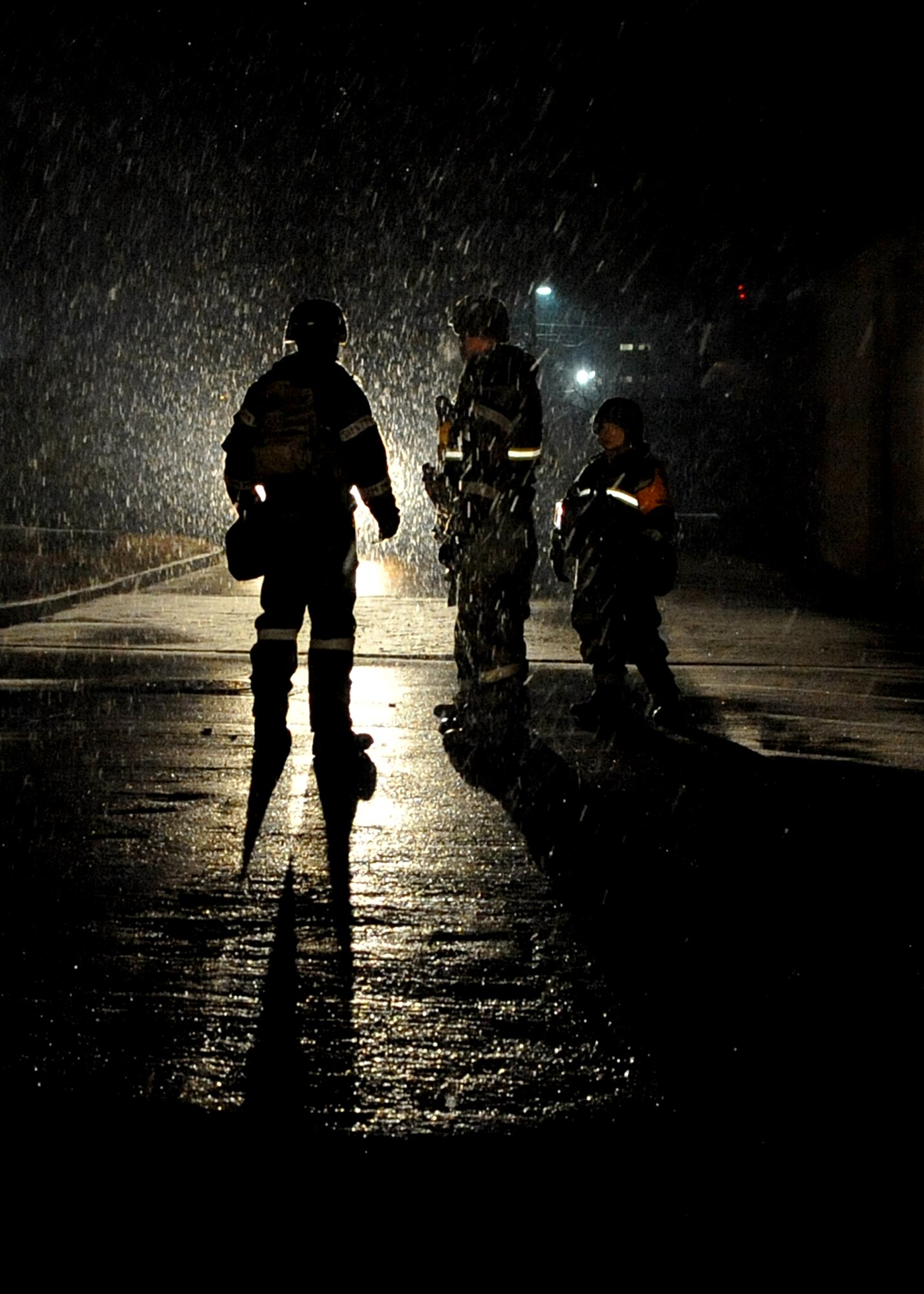51st Fighter Wing Exercise Evaluation Team members asses Airmen during Operational Readiness Exercise Beverly Midnight 11-01 at Osan Air Base, Republic of Korea Feb. 17.  The exercise allows Airmen to demonstrate their ability to complete the mission in simulated chemical environments while executing their primary duties, practicing self aid and buddy care, conduction post-attack reconnaissance and unexploded ordnance sweeps. (U.S. Air Force Photo/Senior Airman Evelyn Chavez)