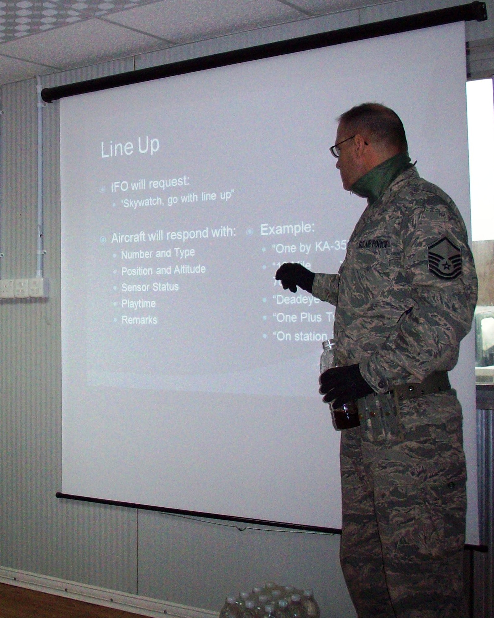 ALI AIR BASE, Iraq -- Master Sgt. Ed Day, a command and control specialist from Nellis Air Force Base, Nev., teaches a class of Iraqi soldiers on ground-to-air radio communication procedures.  Sergeant Day is deployed to the Iraq Training and Advisory Mission – Air as an advisor training different branches of the Iraqi military how to work together seamlessly. (Courtesy Photo)
