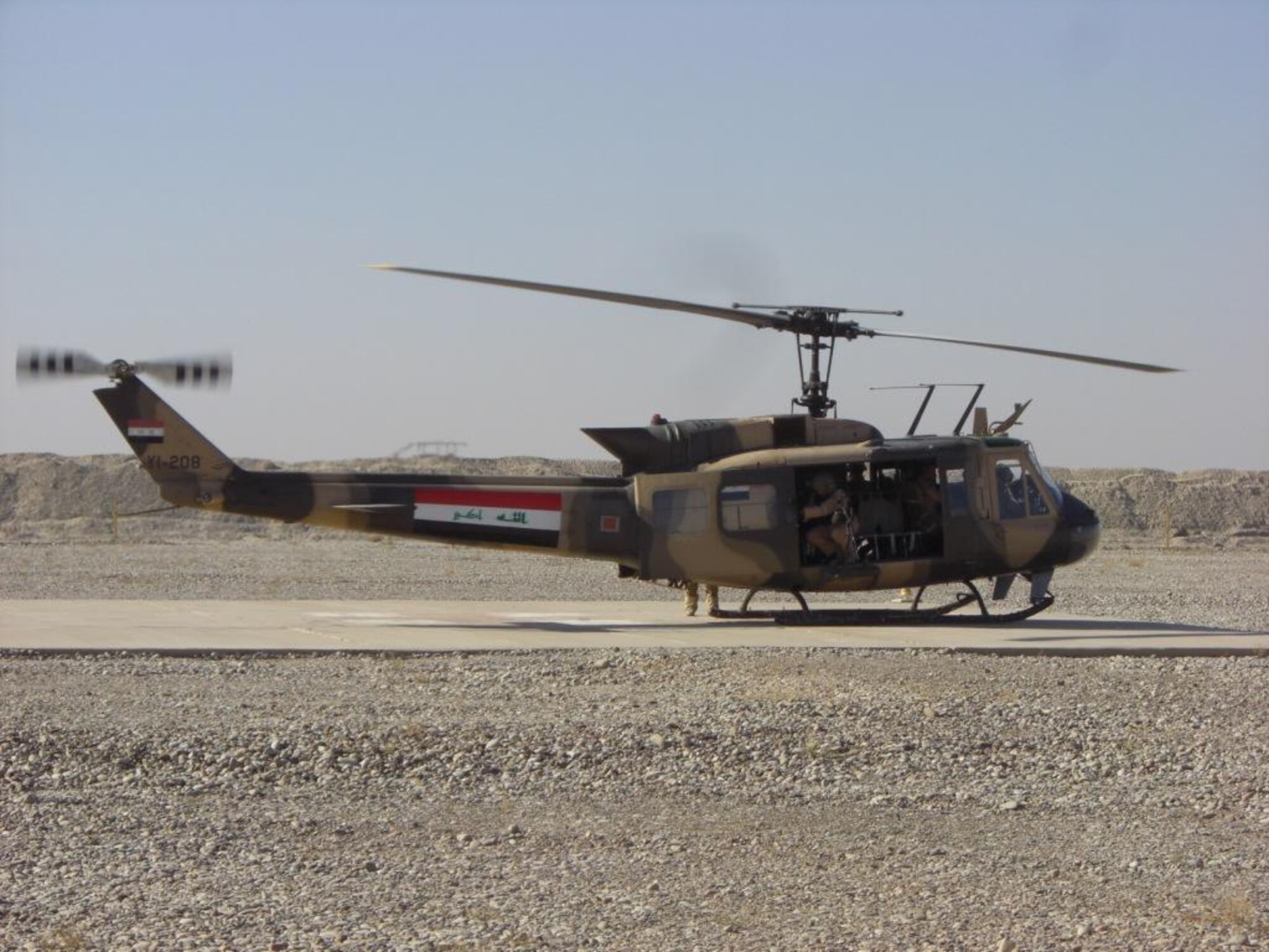 BESMAYA RANGE, Iraq -- An Iraqi Army Aviation Command UH-1 Huey II prepares to lift off from the airfield during an exercise with the Joint Air Operations Integration Team. The JAOIT is training different branches of the Iraqi military how to work together seamlessly. (Courtesy Photo)