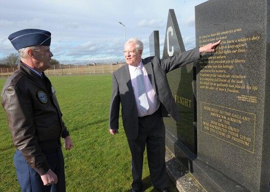 Lt. Gen. John C. Koziol, USAF, is briefed on the 303rd Bomb Group (Heavy) Memorial at RAF Molesworth, England by base historian Peter Park.  Mr. Park points to a moving quotation on the memorial from Gen H. "Hap" Arnold, Commanding General U.S. Army Air Forces during WWII.  U.S. Air Force photo by Scott Tooley.