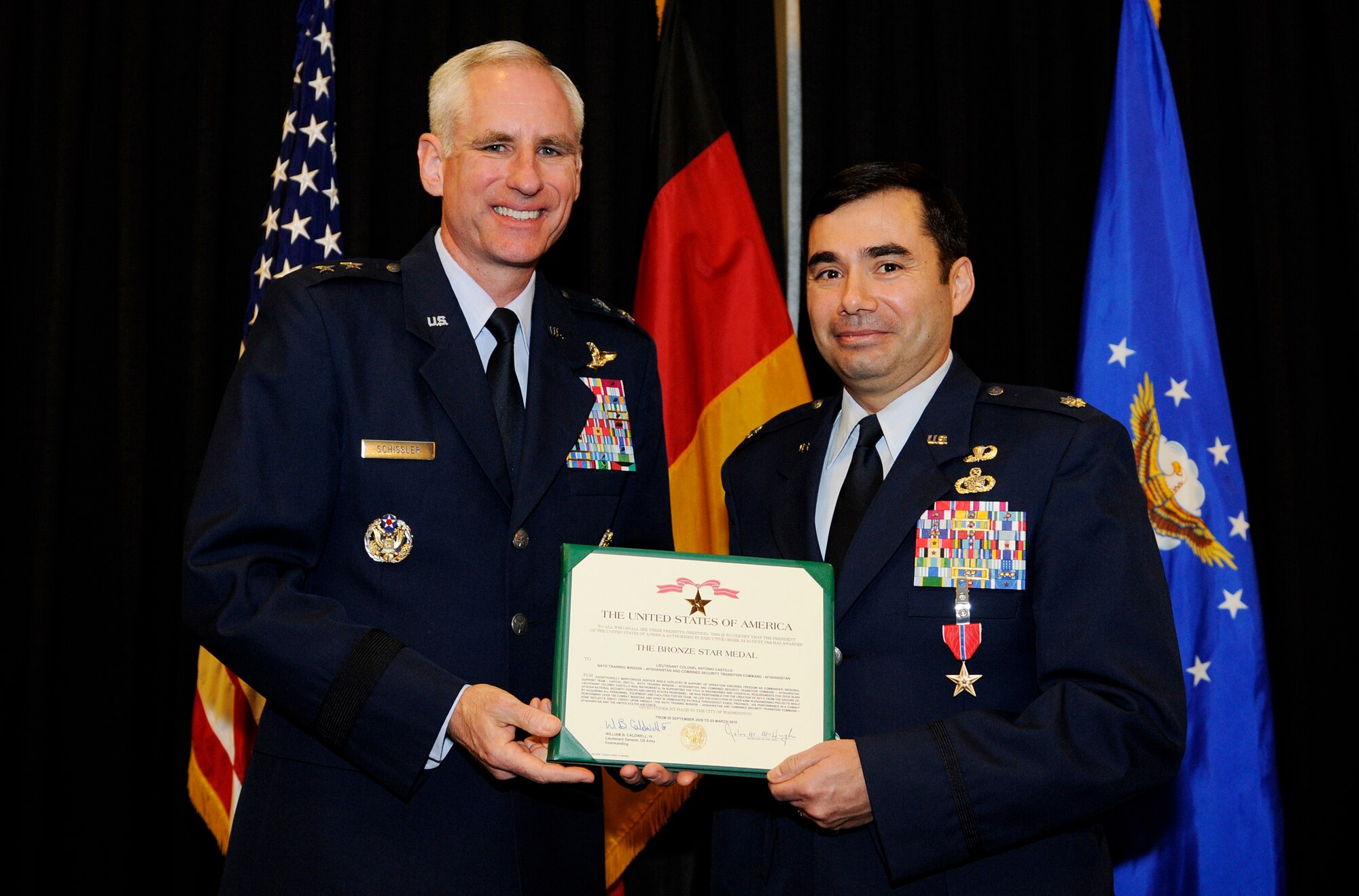 Maj. Gen. Mark Schissler, U.S. Air Forces in Europe director of the Plans, Programs and Analyses Directorate, presents the Bronze Star to Lt. Col. Antonio Castillo, USAFE Directorate of Plans, Programs and Analyses chief of the Geographically Separated Units and Activities management Branch, Feb. 14, 2011, at Ramstein Air Base, Germany. Colonel Castillo was deployed as the Regional Support Team-Capital commander, NATO Training Mission - Afghanistan and Combined Security Transition Command - Afghanistan, from Sept. 5, 2009 to March 3, 2010. He received the Bronze Star for being instrumental in supporting the Title 22 engineering and logistical requirements for more than 20,000 Afghan National Security Forces and U.S. personnel. Creating the RST-C from the ground up, Colonel Castillo led the execution of more than $39 million in engineering projects while performing in more than 100 combat missions and 30 dismount patrols throughout Kabul Province. The Bronze Star is awarded to a person in any branch of the military service who, while serving in any capacity with the U.S. Armed Forces on or after Dec. 7, 1941, shall have distinguished himself by heroic or meritorious achievement or service, not involving participation in aerial flight, in connection with military operations against an armed enemy. It can also be awarded for heroism while serving with friendly forces engaged in combat against an opposing military. (U.S. Air Force photo by Tech. Sgt. Sarayuth Pinthong)