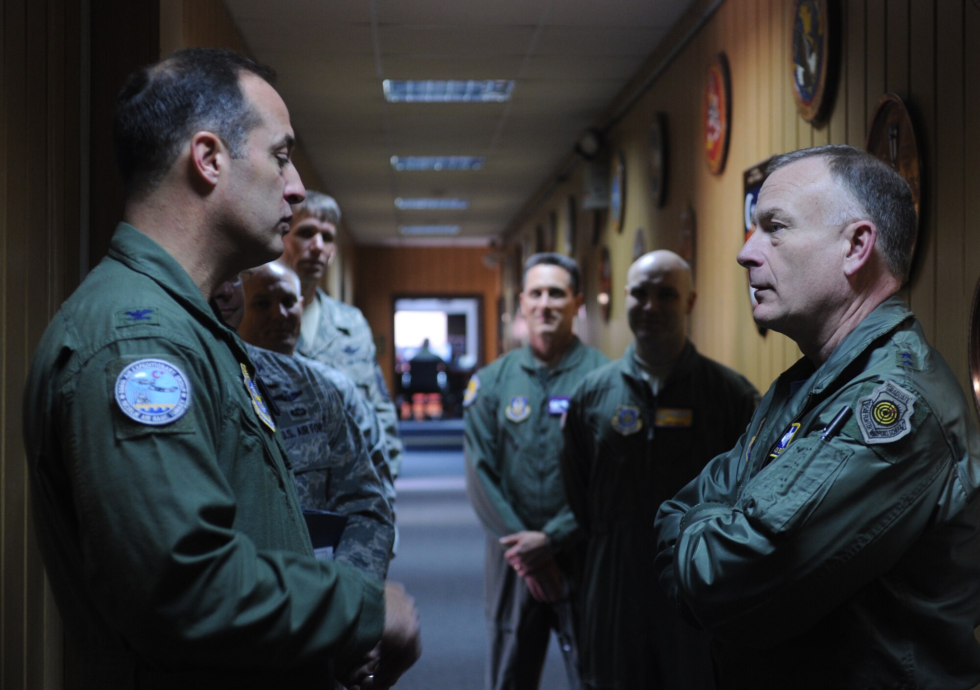 Maj. Gen. Jack Egginton, the director of Air and Space Operations at Headquarters U.S. Air Forces in Europe, speaks with Col. Robert Holba, the 385th Air Expeditionary Group commander, during his visit to Incirlik Air Base, Turkey, Feb. 11, 2011. General Egginton visited the base to tour the facilities and talk with Airmen about upcoming changes and how they will be affected, including their role in the new Expeditionary Combat Support System. The ECSS enhances warfighter support by transforming the way the Air Force performs its logistics business. (U.S. Air Force photo by Airman 1st Class Clayton Lenhardt/RELEASED)