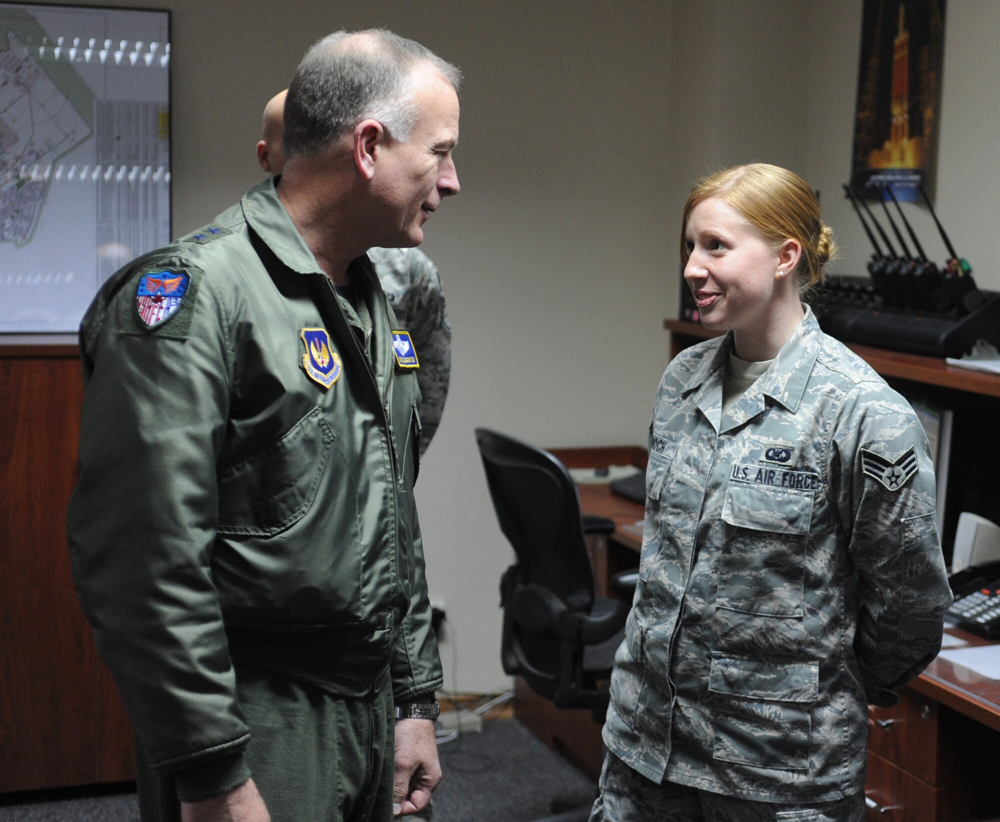 Maj. Gen. Jack B. Egginton, the director of Air and Space Operations at Headquarters U.S. Air Forces in Europe, meets Senior Airman Crystal Bennoch, of the 39th Operations Squadron, during his visit to Incirlik Air Base, Turkey, Feb. 10, 2011. General Egginton visited the base to tour the facilities and talk with Airmen about upcoming changes and how they will be affected, including their role in the new Expeditionary Combat Support System. The ECSS enhances warfighter support by transforming the way the Air Force performs its logistics business. (U.S. Air Force photo by Airman 1st Class Clayton Lenhardt/RELEASED)
 
