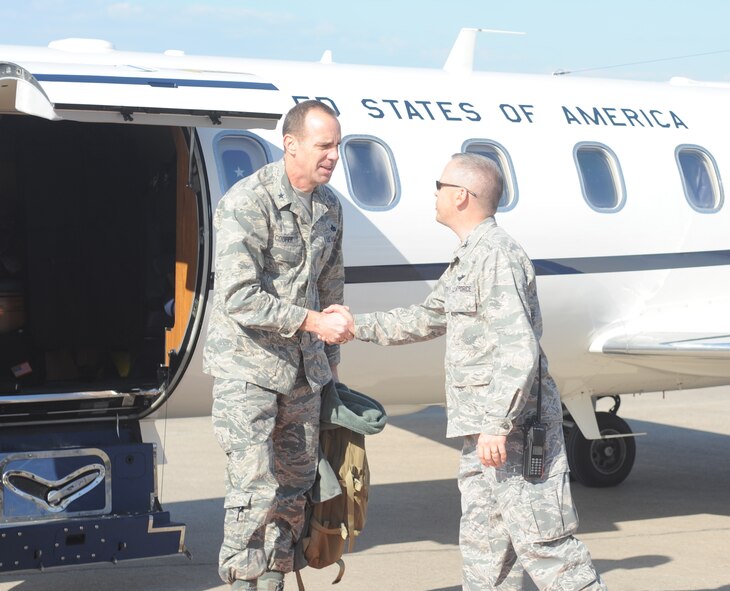 Col. Chad Butts, the 39th Air Base Wing vice commander, greets Brig. Gen. John B. Cooper as he arrives at Incirlik Air Base, Turkey, Feb. 10, 2011. General Cooper is the director of Logistics, Installations and Mission Support for Headquarters U.S. Air Forces in Europe. He visited the base to tour the facilities and talk with Airmen about upcoming changes and how they will be affected, including their role in the new Expeditionary Combat Support System. The ECSS enhances warfighter support by transforming the way the Air Force performs its logistics business. (U.S. Air Force photo by Airman 1st Class Clayton Lenhardt/RELEASED)