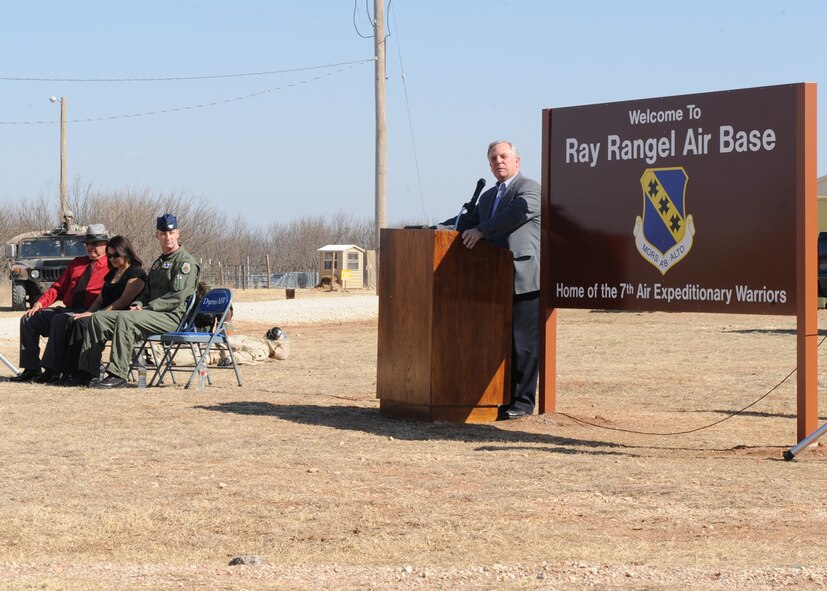 DYESS AIR FORCE, Texas –Norm Archibald, Mayor of Abilene, Texas, speaks to Dyess Airmen Feb. 18 during a dedication ceremony to celebrate Staff Sgt. Ray Rangel's life and commitment to Air Force core values at the cantonment area here. The cantonment area was renamed Ray Rangel Air Base in honor of the fallen sergeant. Sergeant Rangel lost his life more than five years ago while attempting to save three Soldiers trapped in an overturned and submerged Humvee in a canal in northern Iraq. There were fire trucks, explosive ordinance disposal specialists, security forces and ambulance equipment on display, as well as tents and other items for the public to see what deployed life is like. (U.S Air Force Photo/ Airman 1st Class Chelsea Cummings)