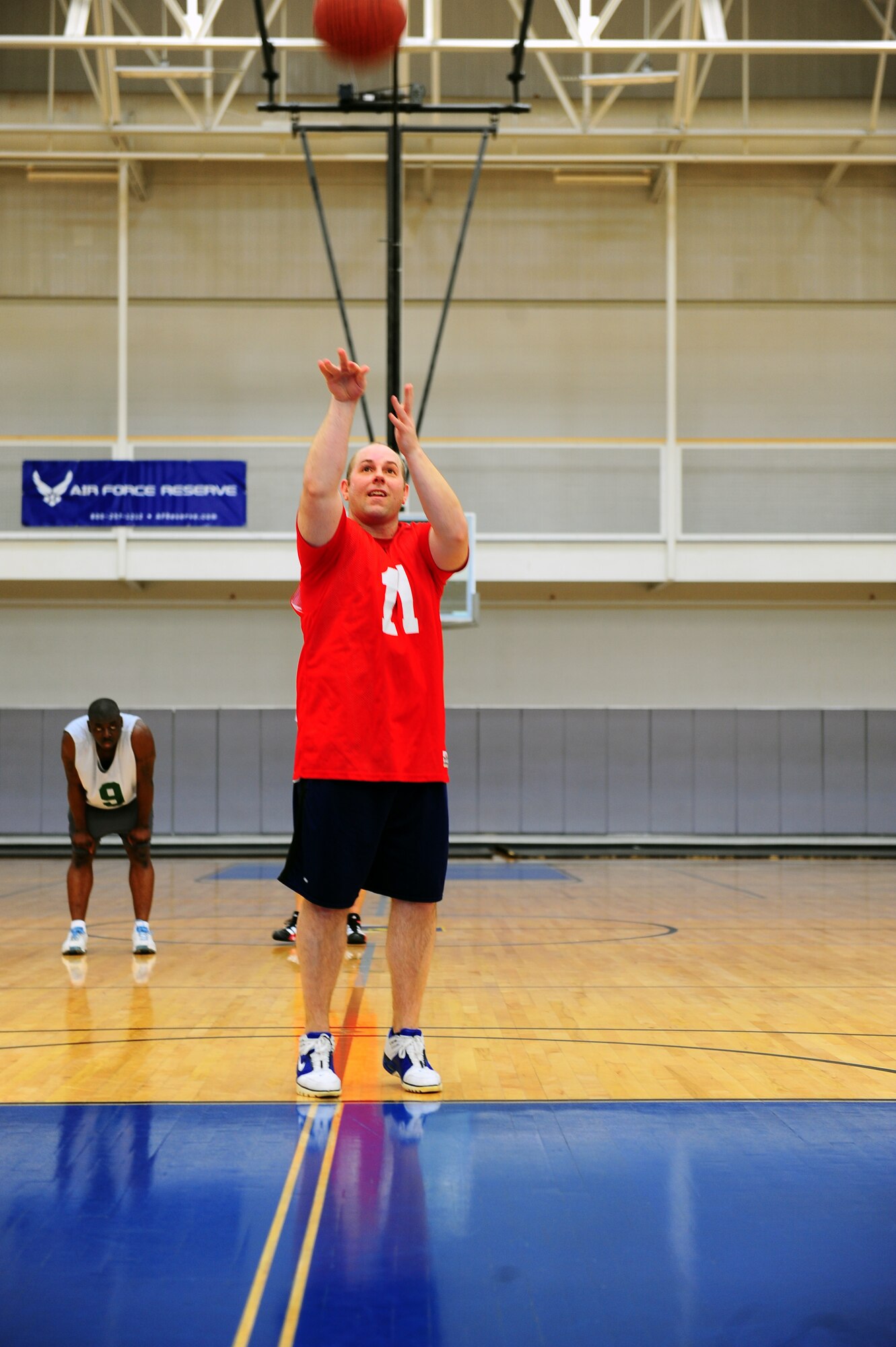 DYESS AIR FORCE BASE, Texas—Michael McKinney, 39th Airlift Squadron, shoots a free throw Feb. 17 during an over-30 basketball game against 7th Aircraft Maintenance Squadron at the fitness center here. McKinney contributed 24 of 55 points scored, including four of six free throws and five rebounds. Over-30 games are played at 11 a.m. and noon Tuesdays and Thursdays at the base fitness center. The fitness center staff schedules make-up games for those contests postponed due to winter weather earlier this month. (U.S. Air Force photo/ Airman 1st Class Courtney Moses)