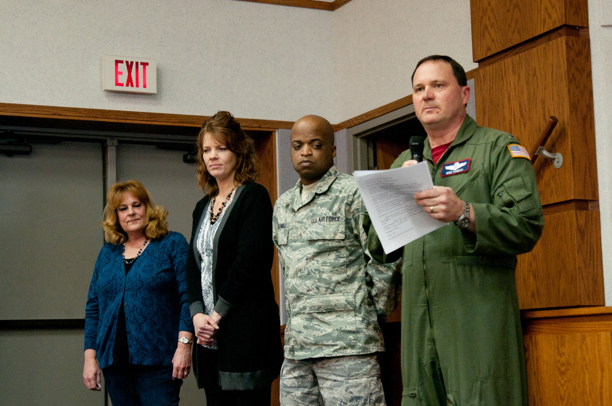Members of the 241st Air Traffic Control squadron receive recognition for winning national awards from Col. Michael Pankau, commander 139th Airlift Wing, February 18, 2011. (U.S. Air Force photo by Master Sgt. Shannon Bond)