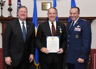 Mr. Michael B. Donley, Secretary of the Air Force and Gen. Philip M. Breedlove, Vice Chief of Staff of the Air Force, present the Air Force Distinguished Public Service Award to Dave Carey, president and chief executive officer of Outrigger Enterprises Group during a ceremony at Joint Base Anacostia-Bolling, Washington, D.C., Feb. 4.
This is the highest honorary civilian award the Secretary of the Air Force may grant to a private citizen for his support of Airmen and their families. (Courtesy photo)
