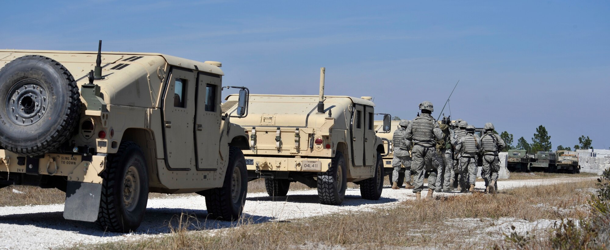 AVON PARK, Fla.-- A convoy from the 823rd Base Defense Squadron from Moody Air Force Base, Ga., moves towards an opposing forces village during joint exercise ATLANTIC STRIKE 11-01 Feb. 15. The squadron was participating as a ground force to help better train the joint terminal attack controllers for combat. (U.S. Air Force photo/Airman 1st Class Nicholas Benroth)(RELEASED)