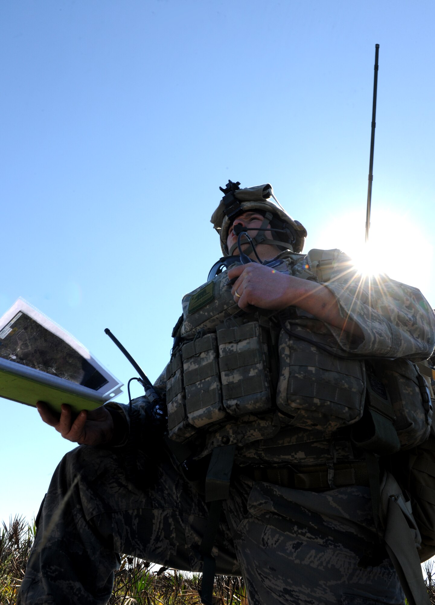 AVON PARK, Fla.-- Staff Sgt. Juan Carreon, 11th Air Support Operations Squadron joint terminal attack controller, Fort Bliss, Texas, calls in an air strike during exercise ATLANTIC STRIKE Feb. 15. Each JTAC was paired with a joint fire observer to conduct each section of the joint forces exercise.  (U.S. Air Force photo/Airman 1st Class Benjamin Wiseman)(RELEASED)