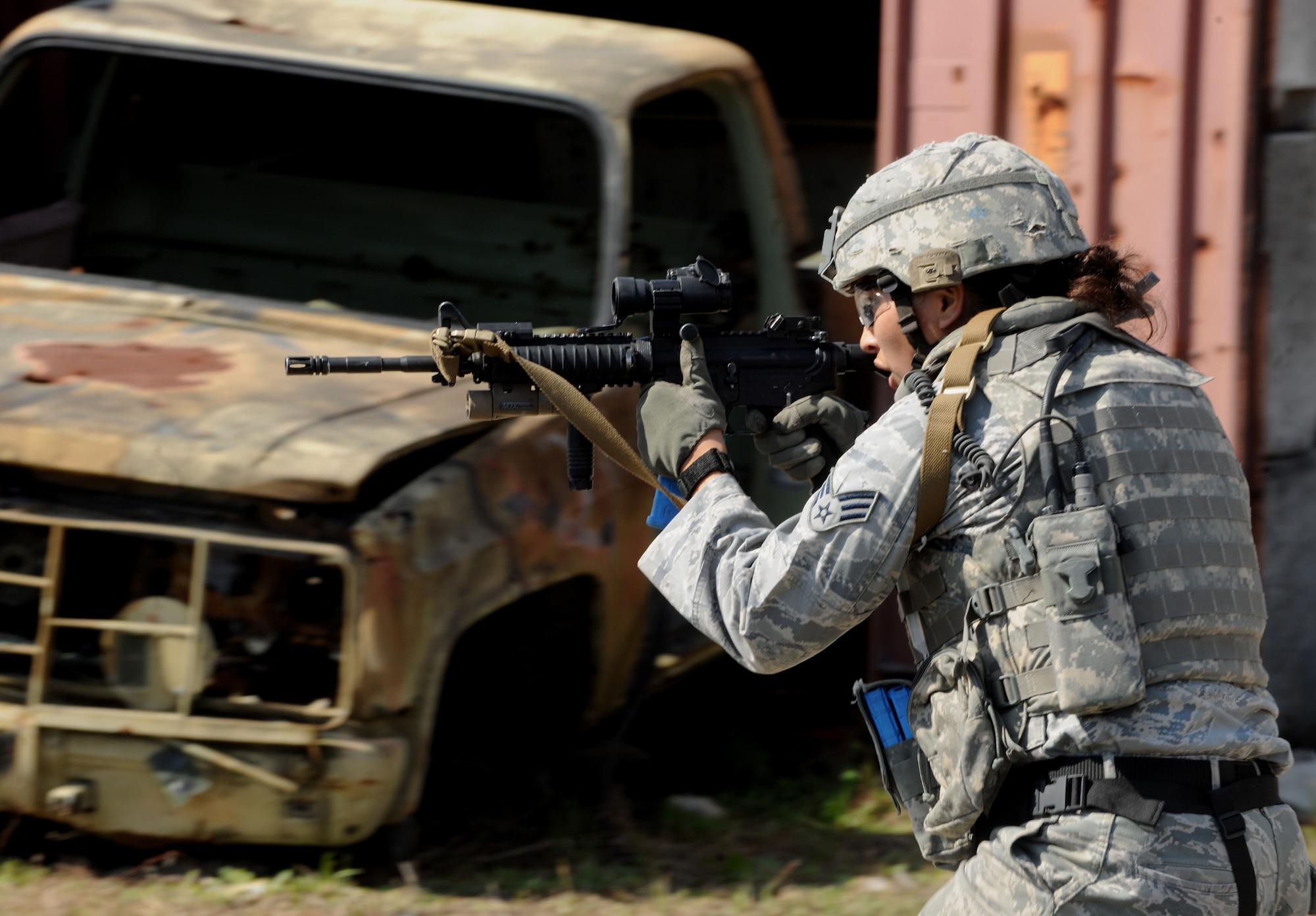 AVON PARK, Fla.-- Senior Airman Camille Espinoza-Rojas, 823rd Base Defense Squadron fire team leader, Moody Air Force Base, Ga.,  runs for cover during joint exercise ATLANTIC STRIKE 11-01 Feb. 16. Airman Espinoza-Rojas was one of the two fire team leaders the 823rd BDS brought to the exercise. (U.S. Air Force photo/Airman 1st Class Benjamin Wiseman)(RELEASED)