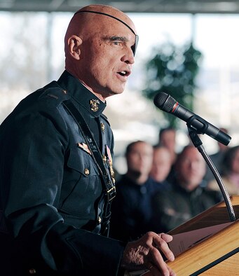 Retired Marine 1st Lt. Clebe McClary speaks at the Air Force Academy's National Prayer Luncheon in the Falcon Club Feb. 10, 2011. Lieutenant McClary, a Vietnam veteran who lost an arm, a leg and an eye in combat, spoke about overcoming adversity through keeping a positive attitude. (U.S. Air Force photo/Mike Kaplan)
