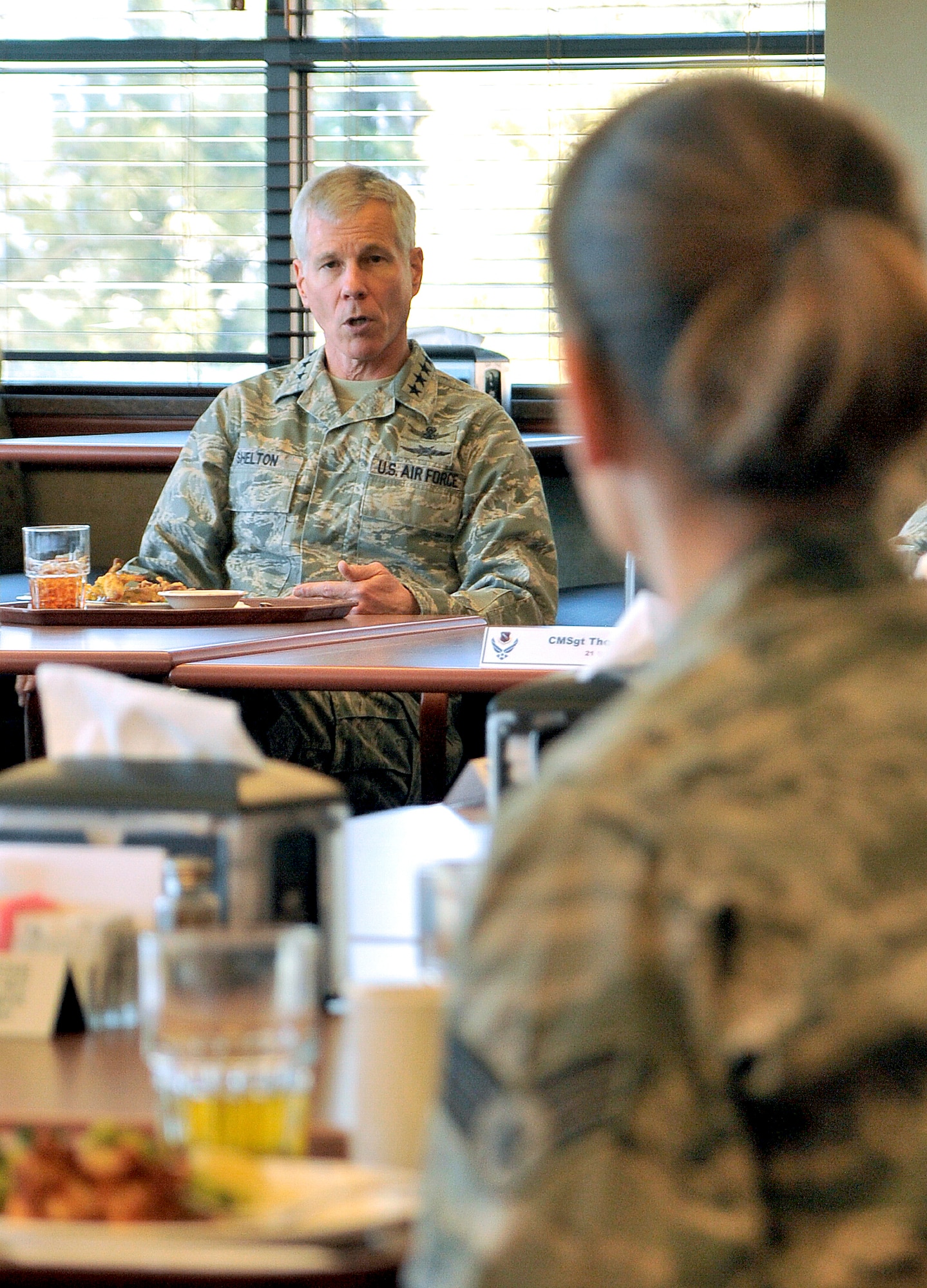 Gen. William L. Shelton, Air Force Space Command commander, had lunch with 20 Airmen from the 21st Space Wing at the Aragon Dining Facility Feb. 11 on Peterson AFB. General Shelton, who took command of AFSPC Jan. 5, visited the 21st SW, including stops at the 16th and 76th Space Control Squadrons. General Shelton hosted a commander’s call in the base auditorium where he discussed his priorities and expectation, and answered questions from Airmen. (U.S. Air Force photo/Duncan Wood)