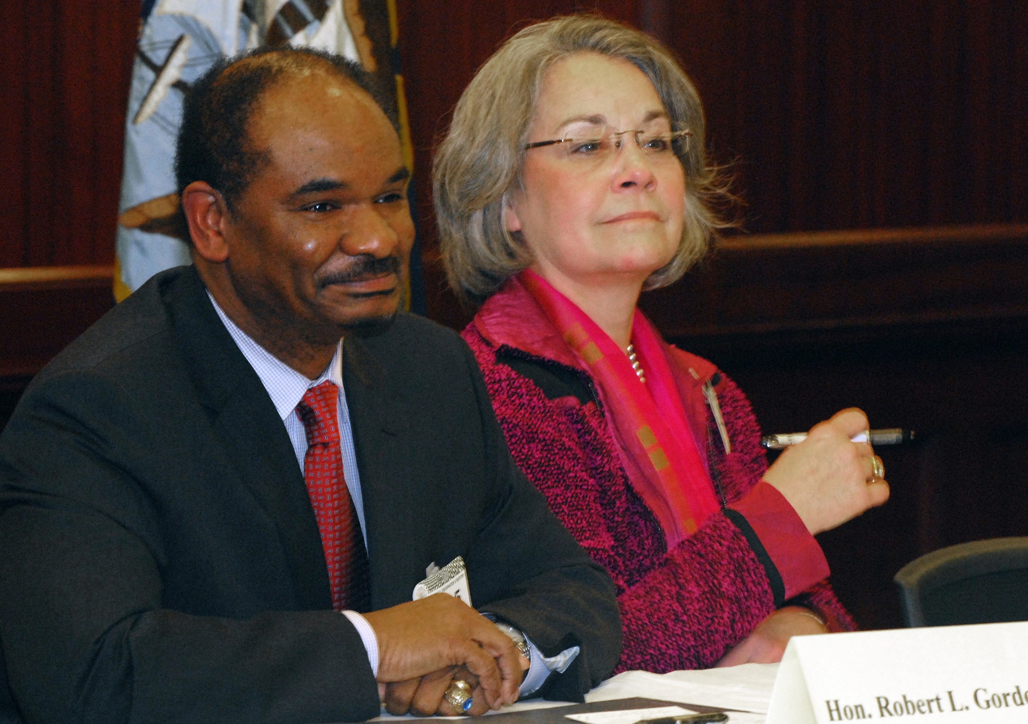 Robert L. Gordon III and Karen Guice take questions Feb. 17, 2011, during the Congressional Military Family Caucus Kickoff in the U.S. Capitol building in Washington. Mr. Gordon is the deputy assistant secretary of defense for military community and family policy. Ms. Guice is the executive director of the Federal Recovery Coordination Program. (Defense Department photo/Elaine Wilson)