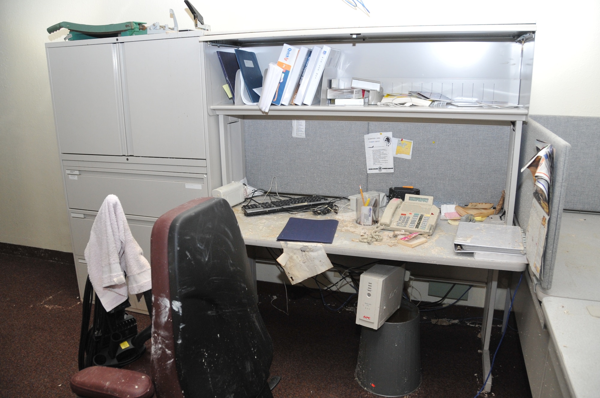 Water from ruptured pipes damaged ceilings, carpets and furniture in many buildings.    U.S. Air Force Photo by Elizabeth Martinez.