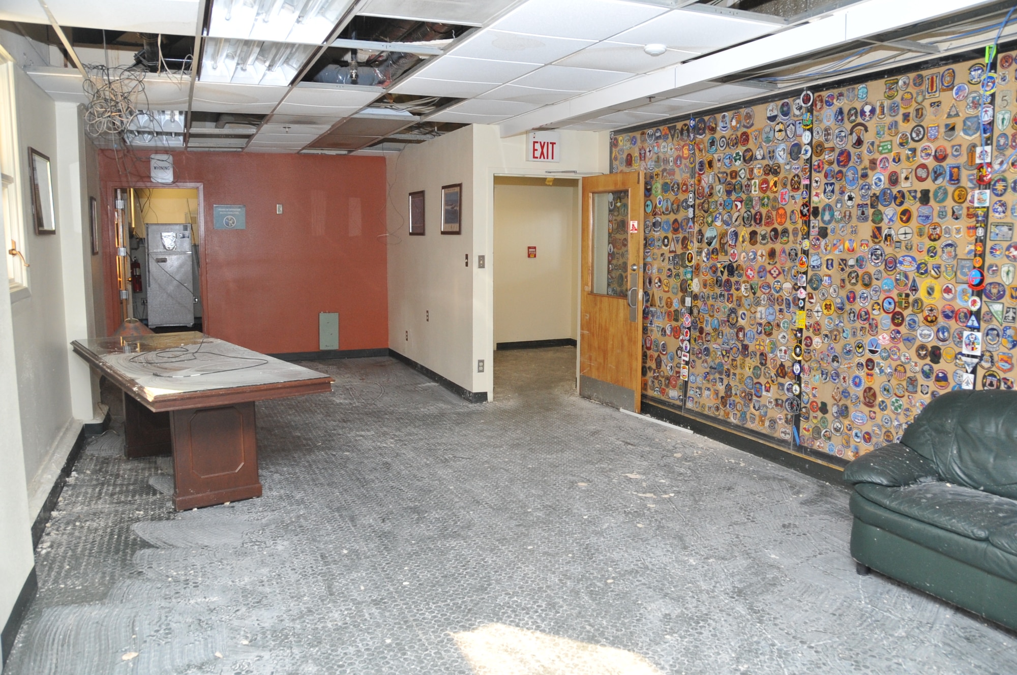 Ceiling panels, along with furniture that lay below, were damaged from freeze-ruptured water pipes.  U.S. Air Force Photo by Elizabeth Martinez.