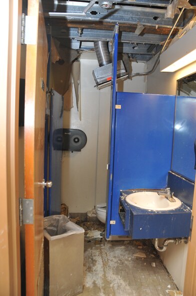 In certain areas, entire ceilings need replacement due to water damage caused by freeze-ruptured pipes.  U.S. Air Force Photo by Elizabeth Martinez.