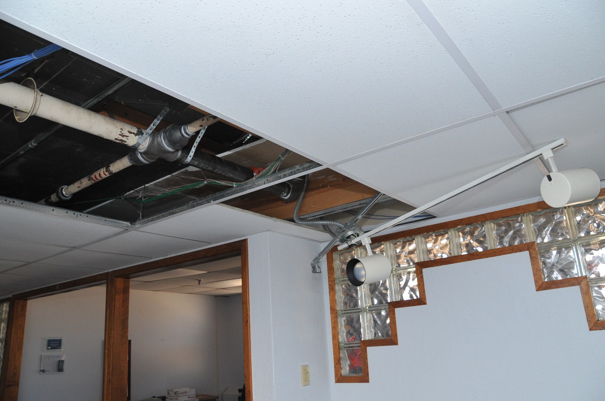 The storm caused damage to ceilings, walls and light fixtures in many buildings.  U.S. Air Force Photo by Elizabeth Martinez.