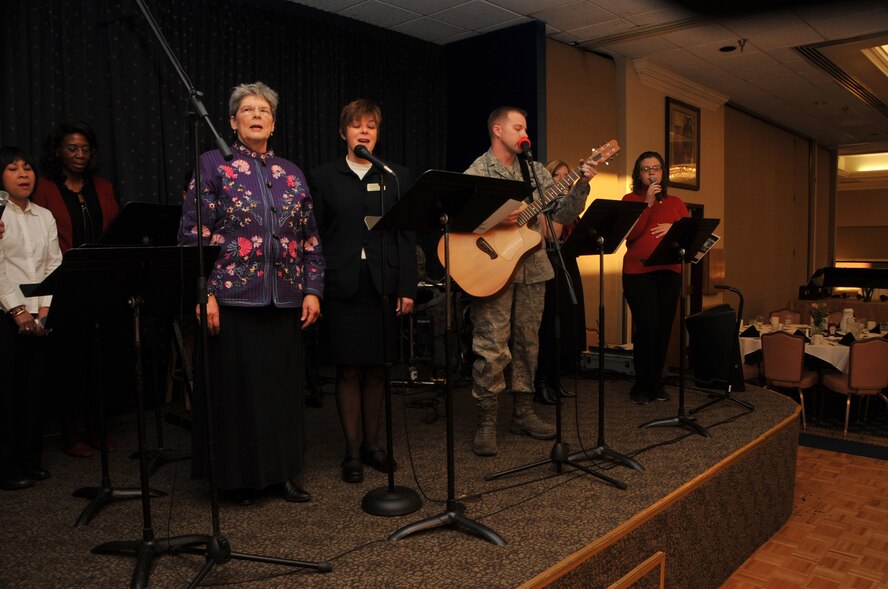 Musicians from the Protestant and Catholic communities at the Chapel provide inspirational music during the breakfast.  U.S. Air Force Photo by Todd Berenger. 