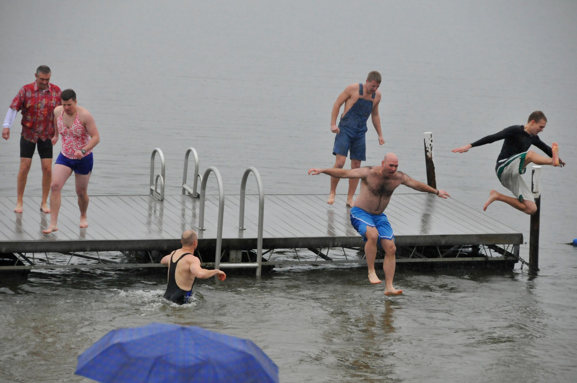 Steve Passarello, 2nd Lt. Will Parker, Capt. Alex Hausman, 1st Lt. Alex Henning, 2nd Lt. Wes Meredith and 2nd Lt. J.J. Labouliere take the Polar Bear Plunge. (Photo by Rick Goodfriend)