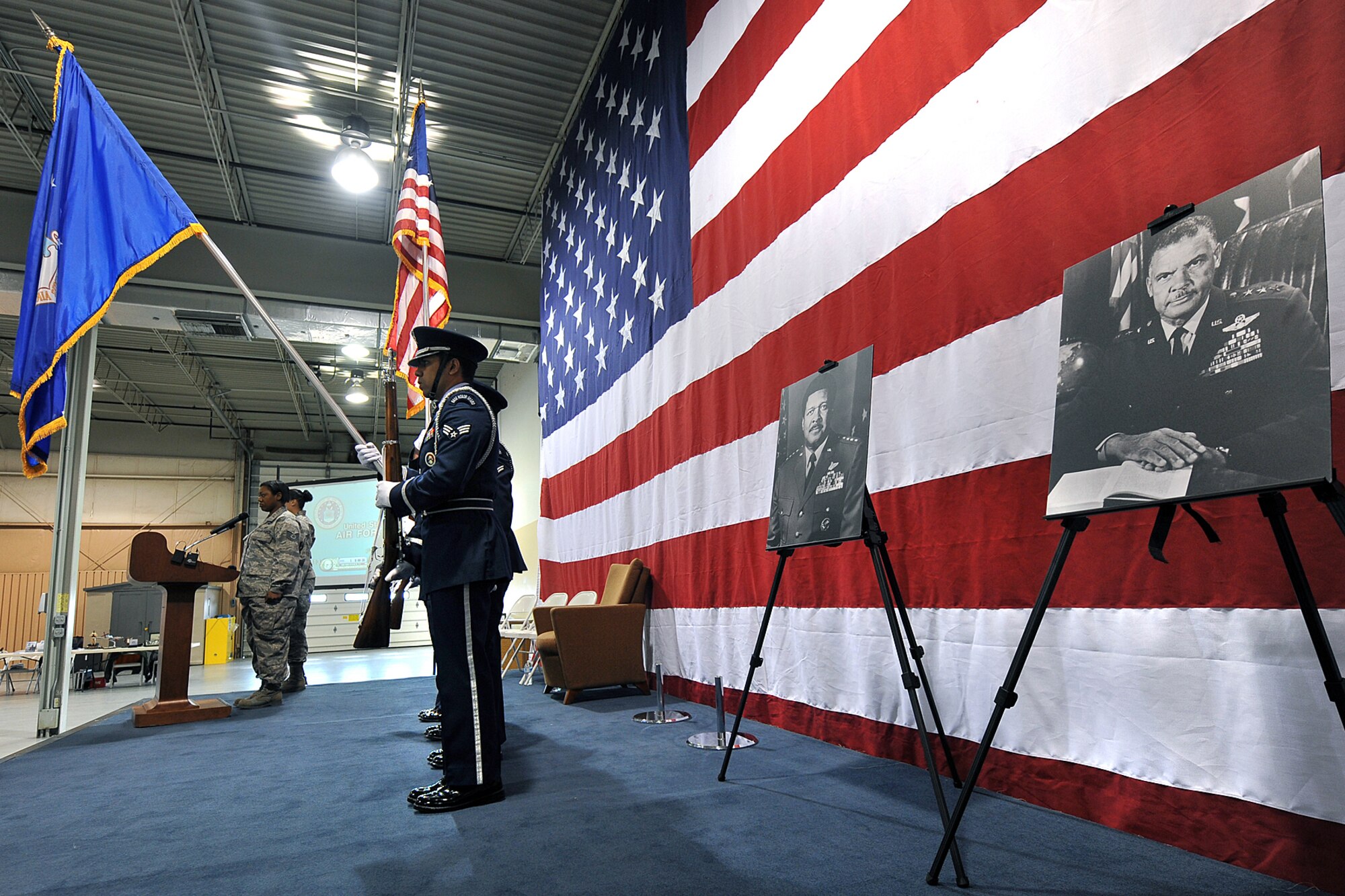 OFFUTT AIR FORCE BASE, Neb. - Offutt Air Force Base Honor Guard members post the colors during the Tuskegee Airmen event inside the James M. McCoy Airmen Leadership School Auditorium. Air Force Photo by Charles Haymond