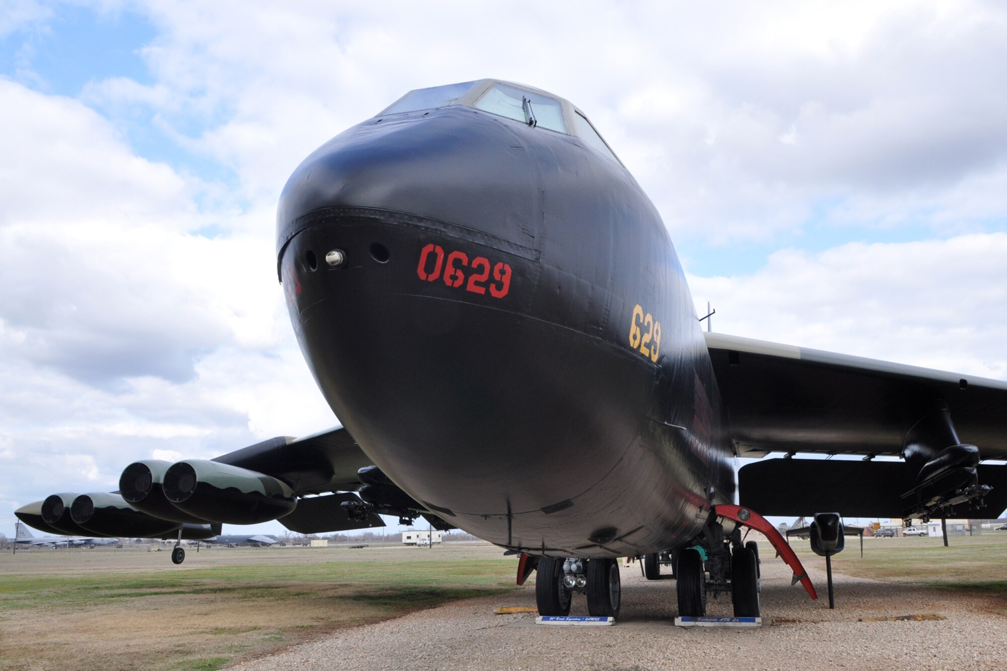 A Boeing B-52D "Stratofortress" sits on display at the 8th Air Force Museum on Barksdale Air Force Base, La., Feb. 16, 2011. Since becoming operational in 1955, the B-52 has been the main long-range heavy bomber of the Air Force. The B-52 has set numerous records during its many years of service. On Jan. 18, 1957, three B-52s completed the world's first non-stop around-the-world flight by jet aircraft. There were three aerial refuels during the trip. This particular aircraft saw extensive service in Southeast Asia, flying over 400 combat sorties. It was the last B-52D to retire from March Air Force Base, Calif., and was flown to Barksdale AFB in 1983. (U.S. Air Force photo/Tech. Sgt. Jeff Walston)