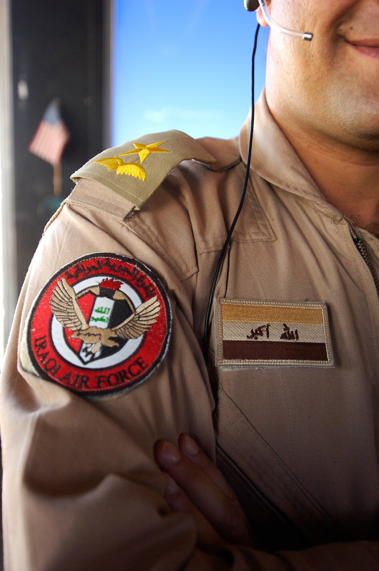 KIRKUK REGIONAL AIR BASE, Iraq -- An Iraqi Air Force air traffic controller directs air traffic at the tower Feb. 9. IqAF trainees must log more than 90 hours of on-the-job training before taking their certification exam and applying for their Iraqi Civil Aviation Authority license. The goal of Iraq Training and Advisory Mission-Air senior ATC officials is to certify and license at least 24 controllers before drawdown is complete. (U.S. Air Force/Tech. Sgt. Jason Lake)