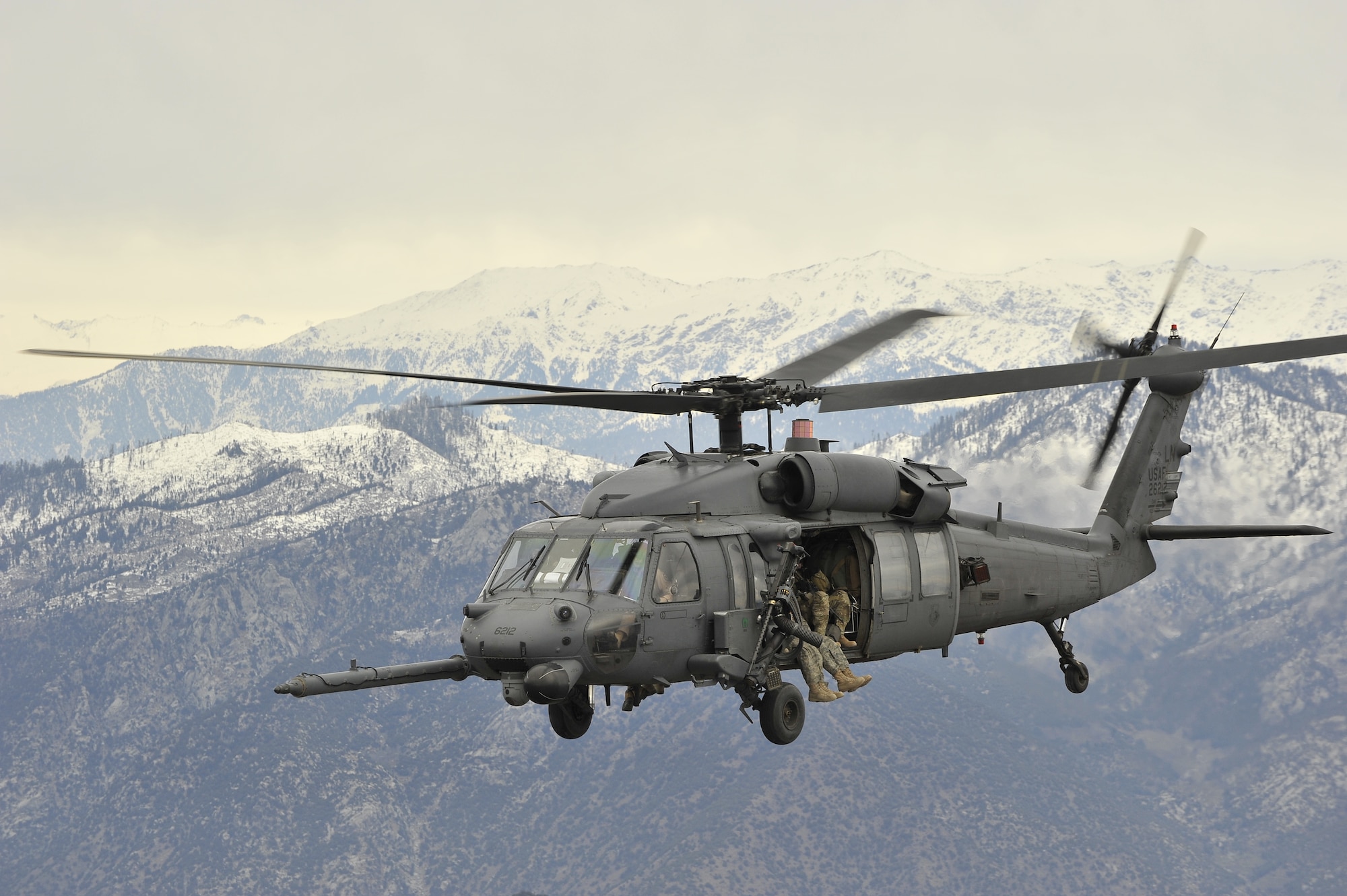 An HH-60G Pave Hawk assigned to Bagram Airfield's 83rd Expeditionary Rescue Squadron returns from a reposition mission in northern Afghanistan.  The squadron occasionally repositions personnel and aircraft to forward operating bases to provide casualty evacuation support to planned ground operations.  (U.S. Air Force photo/Capt. Erick Saks)