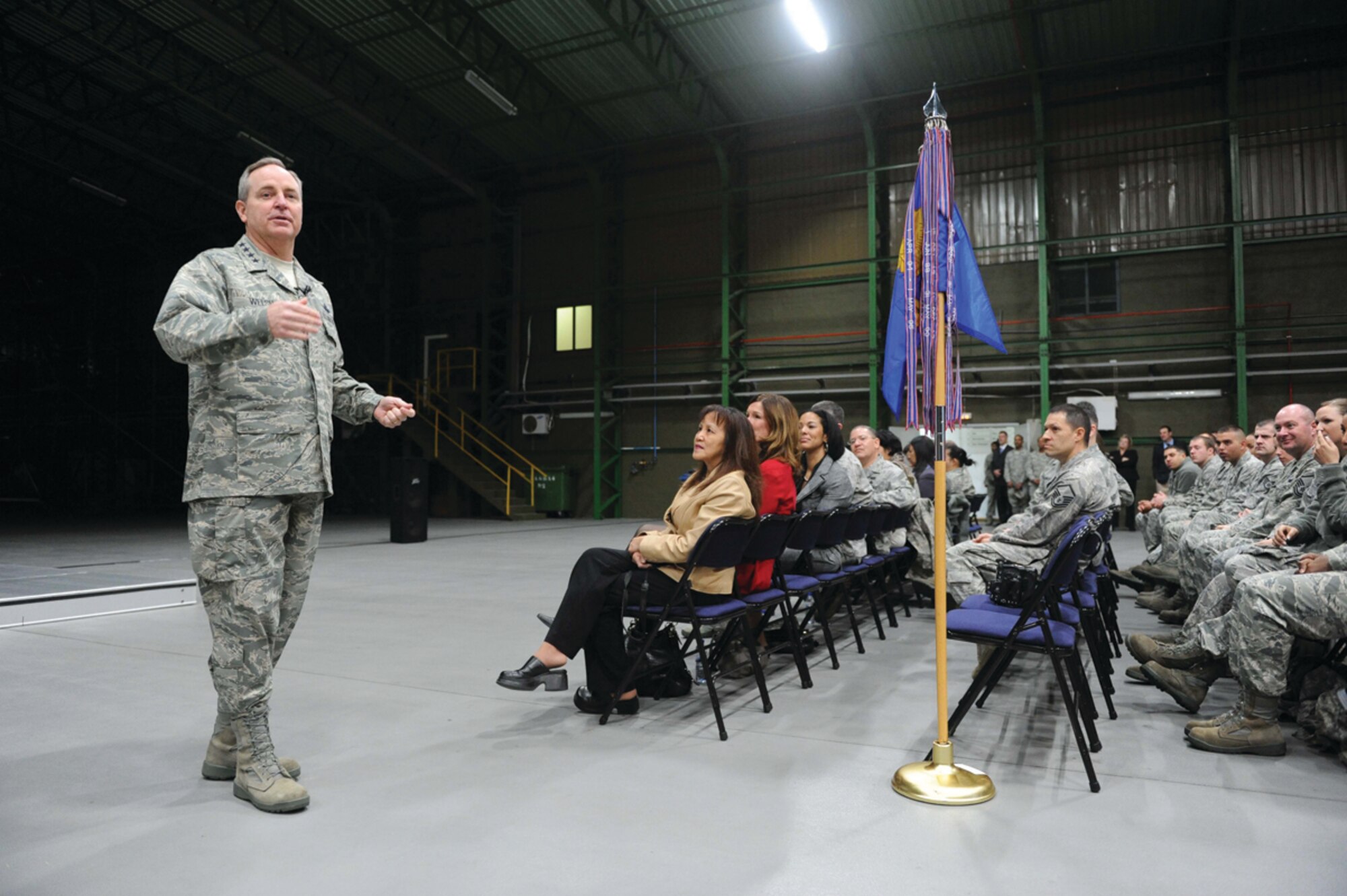 (Left) Gen. Mark A. Welsh III, U.S. Air Forces in Europe commander, speaks to the Airmen of the 65th Air Base Wing at a commander’s call at Lajes Field, Azores, Feb. 16. General Welsh and Chief Master Sgt. David Williamson, USAFE command chief, were on a two-day visit to the wing to see the men and women of Lajes Field, Azores, Feb. 15-16. This visit to Lajes was the team’s first to the wing after General Welsh took command of USAFE. (Photo by Guido Melo)
