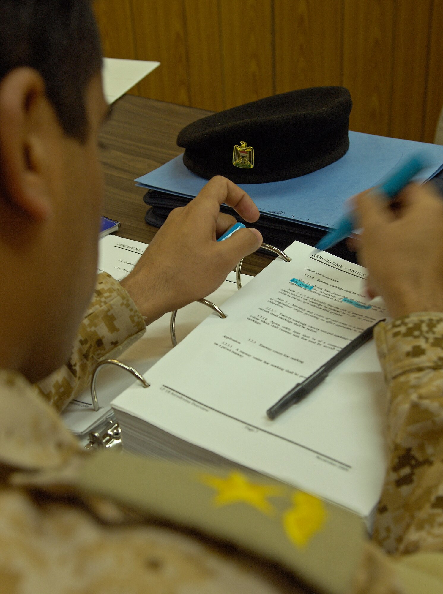 ALI AIR BASE, Iraq -- An Iraqi air force student highlights course notes during the Iraq Training and Advisory Mission–Air's aerodrome class Feb. 3. Since U.S. forces began providing ATC training in 2006, six IqAF trainees have been licensed by the Iraqi Civil Aviation Authority - the equivalent to the U.S. Federal Aviation Administration - a first for the Iraqi military in modern history. (U.S. Air Force/Tech. Sgt. Jason Lake)