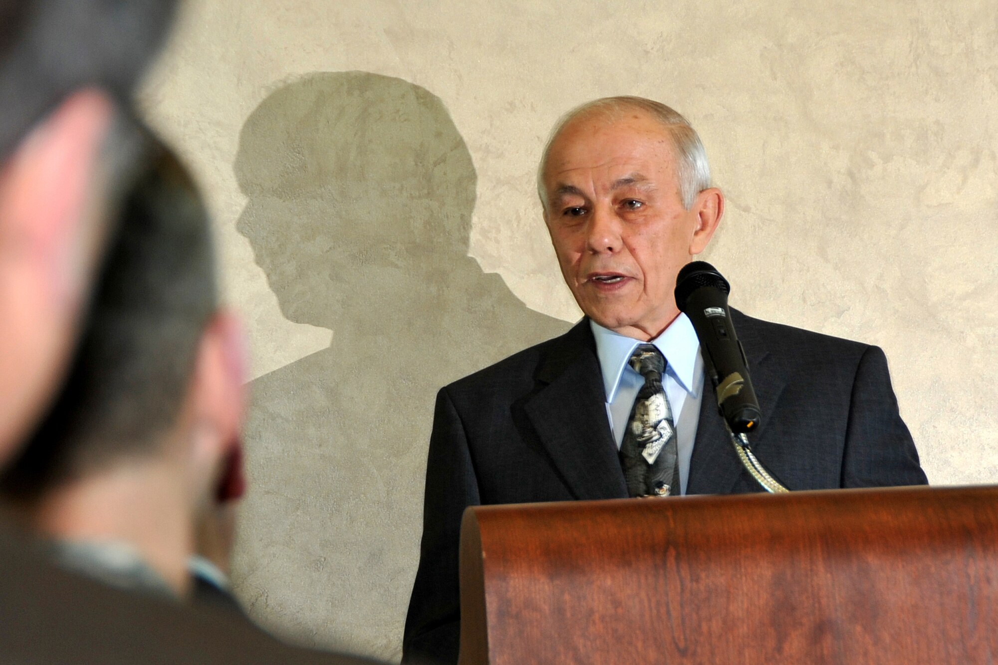 OFFUTT AIR FORCE BASE, Neb. -- Retired Chief Master Sgt. Peter Morris talks about his career in Air Force Weather during the dedication of the Air Force Weather Agency auditorium in his name here Feb. 15. Chief Morris served 30 years in the Air Force and is widely recognized as one of their finest enlisted leaders and weather warriors. (Air Force photo by Jeff W. Gates)