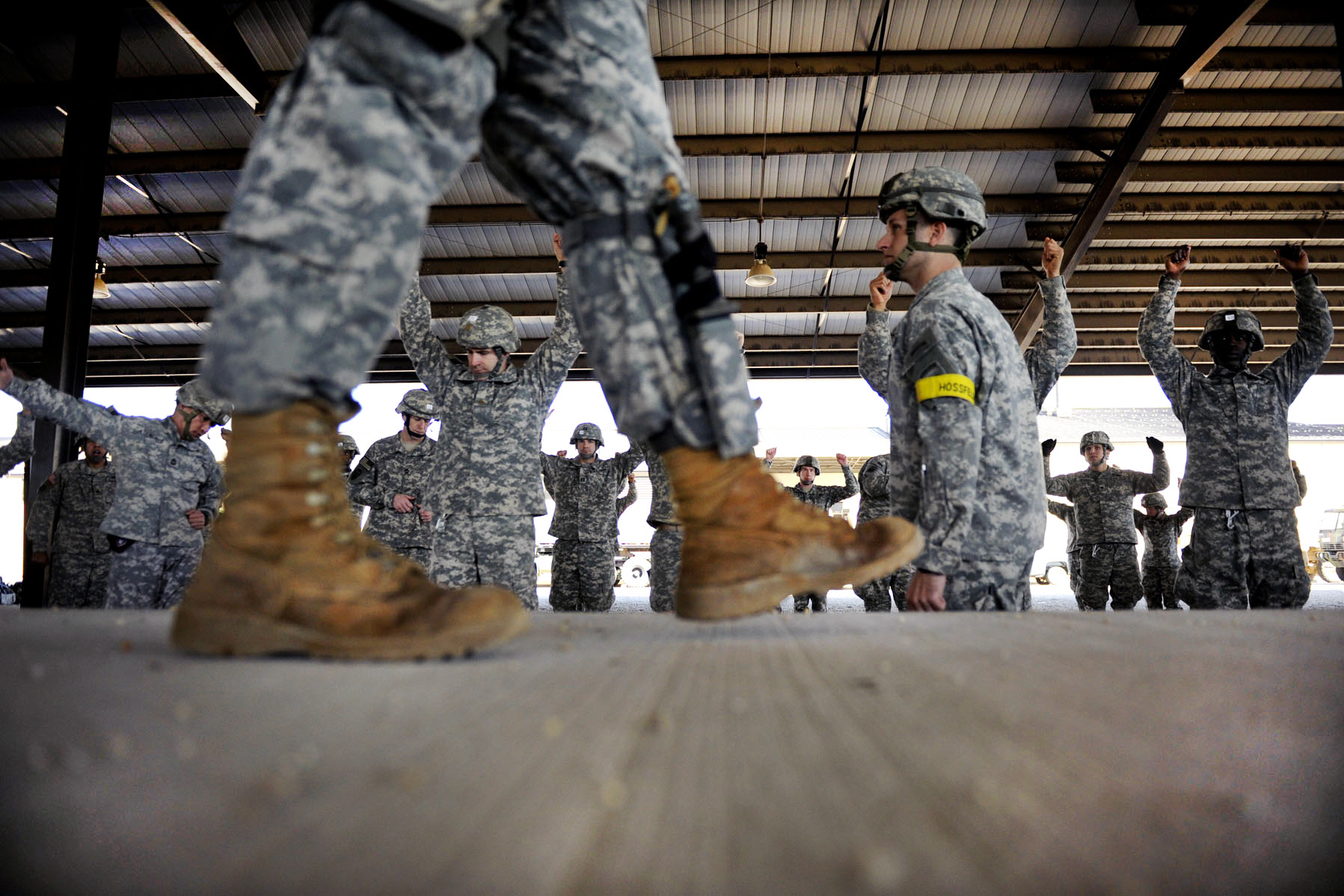 U.S. Army jumpmasters review parachute landing and falling procedures