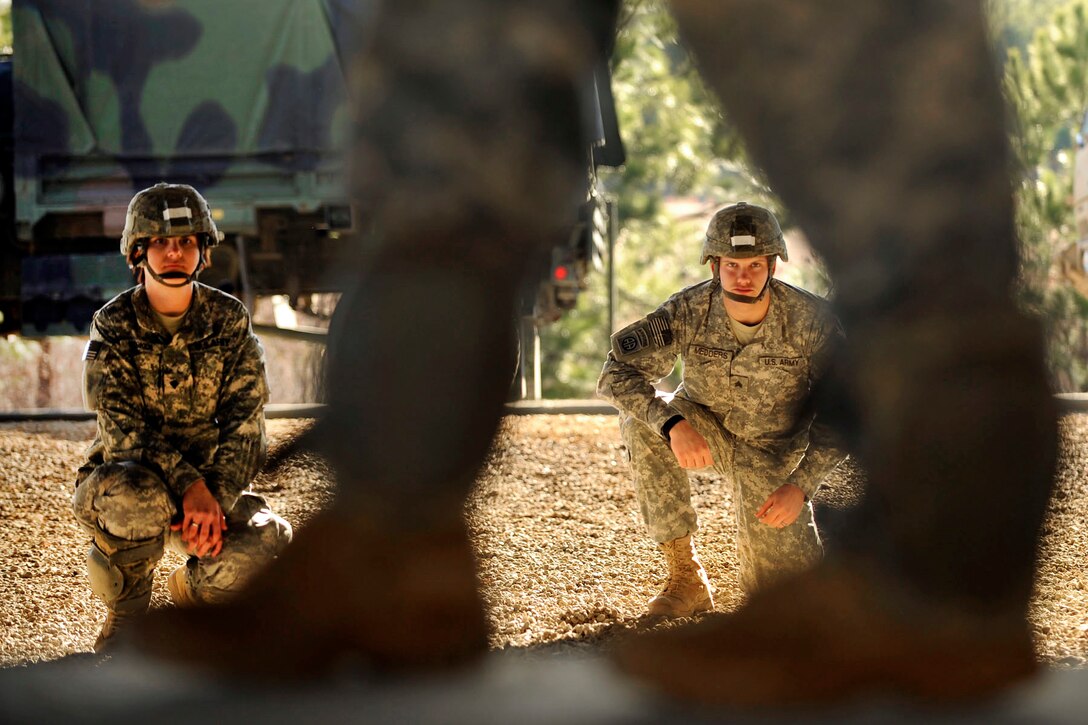 U.S. Army paratroopers practice parachute landing and falling procedures on Pope Air Force Base, N.C., Feb. 9, 2011.