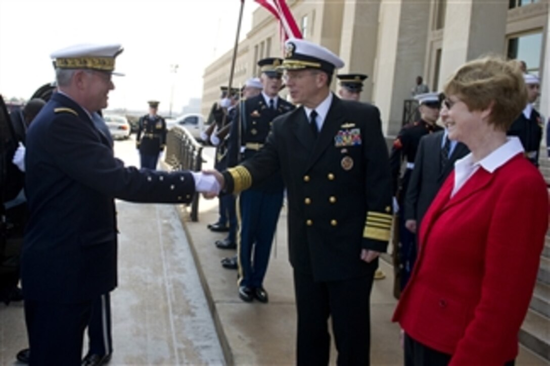 Chairman of the Joint Chiefs of Staff Adm. Mike Mullen, U.S. Navy, and his wife Deborah welcome French Chief of the Armed Forces General Staff Adm. Edouard Guillaud to the Pentagon in Washington, D.C., on Feb. 18, 2011.  
