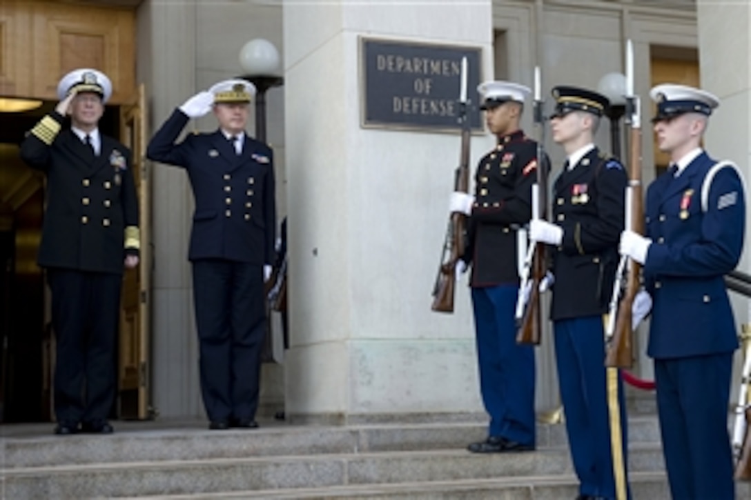 Chairman of the Joint Chiefs of Staff Adm. Mike Mullen, U.S. Navy, welcomes French Chief of the Armed Forces General Staff Adm. Edouard Guillaud to the Pentagon in Washington, D.C., on Feb. 18, 2011.  