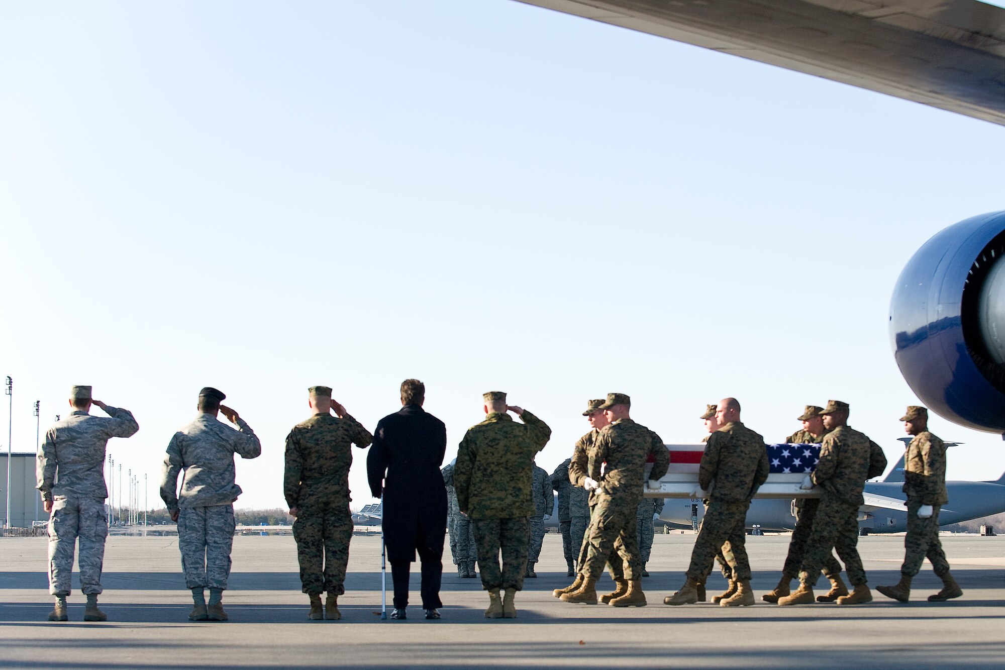 A U.S. Marine Corps carry team transfers the remains of Marine Sgt. Matthew DeYoung, of Talent, Ore., at Dover Air Force Base, Del., Feb. 19, 2011. DeYoung was assigned to the 2nd Reconnaissance Battalion, 2nd Marine Division, II Marine Expeditionary Force, Camp Lejeune, N.C.  (U.S. Air Force photo/Roland Balik)