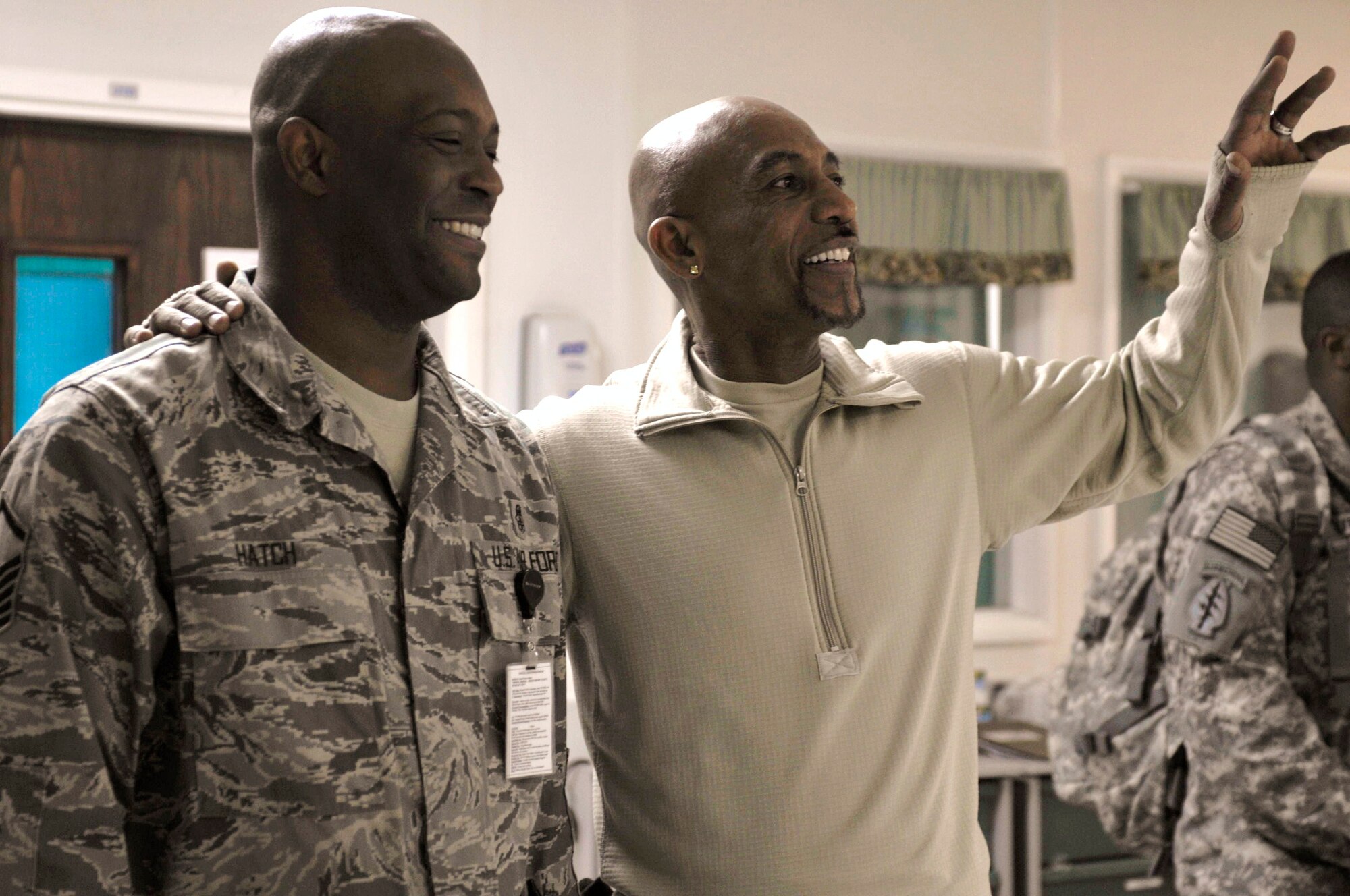 Television talk-show host Montel Williams tours the Craig Joint Theater Hospital at Bagram Airfield, Afghanistan 19 Feb. Accompanied by International Security Assistance Force and U.S. Forces Afghanistan Senior Enlisted Leader, Command Sergeant Maj. Marvin Hill, Mr. Mark "Ranger" Jones and Col. (Ret) Bob Ulin they talked to Airmen about their deployments and thanked them for their service. (U.S. Air Force photo by Tech. Sgt. Michael Voss)  