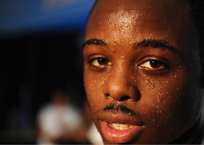 U.S. Army Sgt. John Franklin catches his breath following his Armed Forces Boxing Championships 114 lb. title bout Feb. 18 at Lackland Air Force Base, Texas. Franklin defeated U.S. Marine Corps Cpl. Alex Diaz, earning the chance to compete in the 2012 Olympic team trials. Originally from Kansas City, Mo., Franklin is currently stationed at Fort Carson, Colo. He is a 2010 National Bronze Medalist and an All-Army champion since 2005. (U.S. Air Force photo/Staff Sgt. Sharida Jackson)