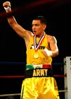U.S. Army Sgt. Toribio Ramirez celebrates following his victory in the Armed Forces Boxing Championships 132 lb. title bout Feb. 18 at Lackland Air Force Base, Texas. Ramirez defeated the 2010 defending champion, U.S. Marine Corps Lance Cpl. Tommy Roque with a final score card of 17-14. (U.S. Air Force photo/Staff Sgt. Sharida Jackson)
