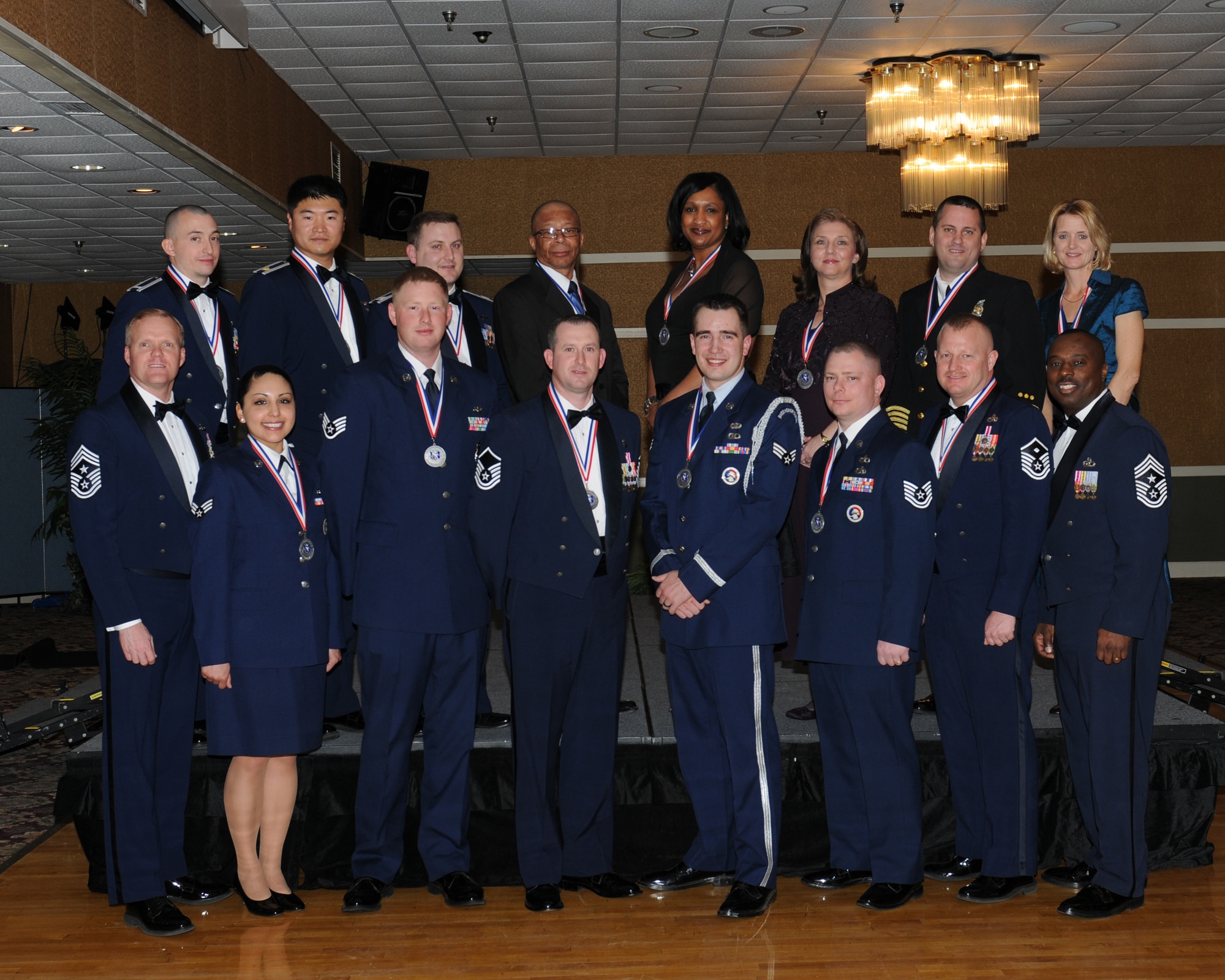Air Education and Training Command Command Chief Master Sgt. James Cody and 14th Flying Training Command Chief Zefrem Smith pose with the 2010 Annual Award Winners at the Columbus Club on Feb. 11. (U.S. Air Force photo/Melissa Doublin).
