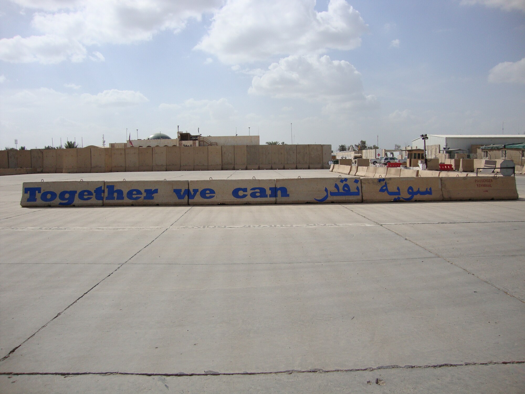 BAGHDAD -- A new flightline mural welcomes Iraqi and U.S. Airmen to Sather Air Base. The artwork was the idea of Brig. Gen. Anthony Rock, the 321st Air Expeditionary Wing commander and Iraq Training and Advisory Mission – Air director, to improve the aesthetics of the area and promote teamwork.  (Courtesy photo)